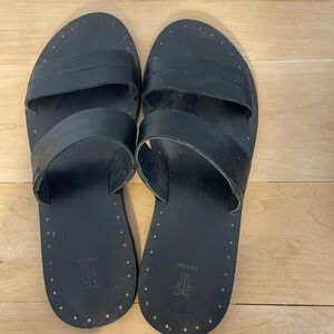 Frye black slip on sandals with lovely stud detailing